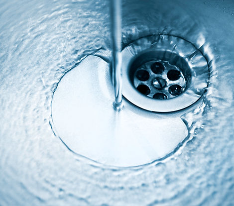 drain with water running kitchen faucet (darker variation shot)running kitchen faucet