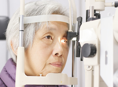 An elderly woman having a glaucoma screening
