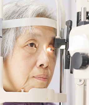 Woman Having Eyes Examined