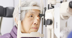 Woman Having Eyes Examined