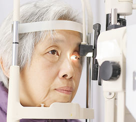 Woman Having Eyes Examined