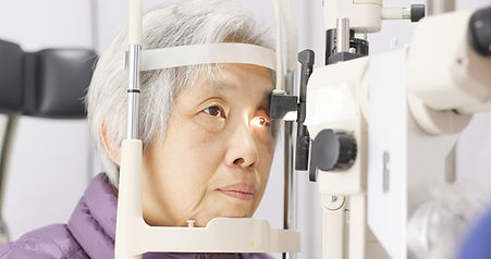 Woman Having Eyes Examined