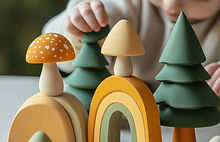 Child Playing with Wooden Toys