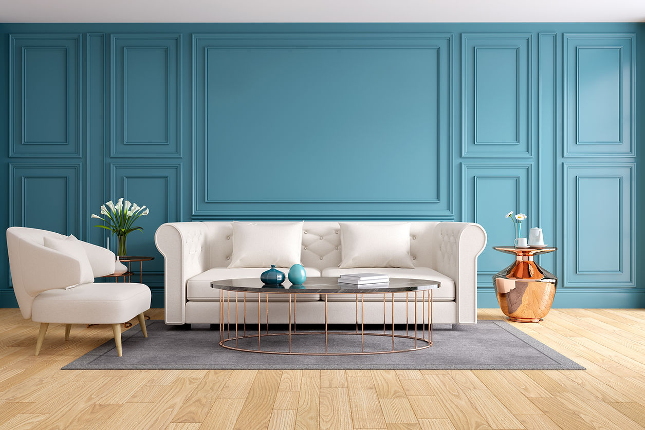 Elegant living room with a white sofa and chair on a light wood floor