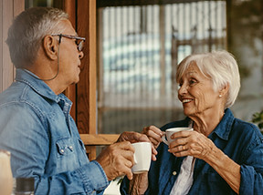 Two people chatting in a cafe