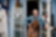 Man Standing Outside Shop