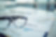 Close-up of business documents with glasses on the table