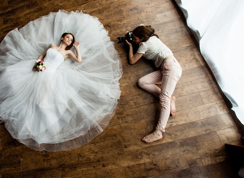 Bride and photographer scene