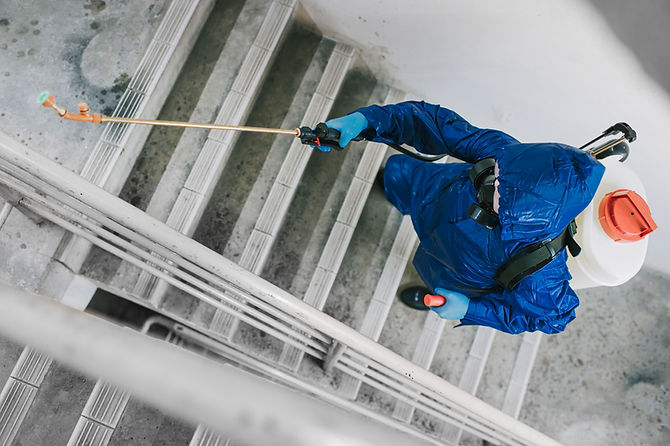 Spraying Chemical on Stairs