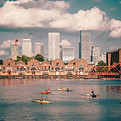 Kayaking by Cityscape