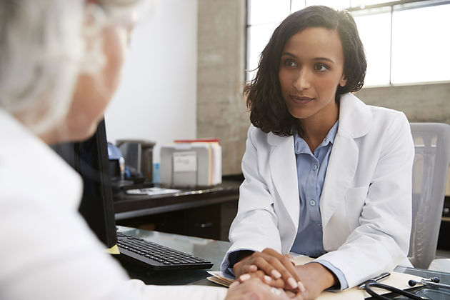 Lady speaking to a doctor