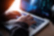 A person working on a laptop PC
