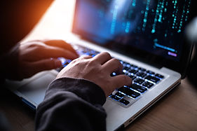 A person working on a laptop PC
