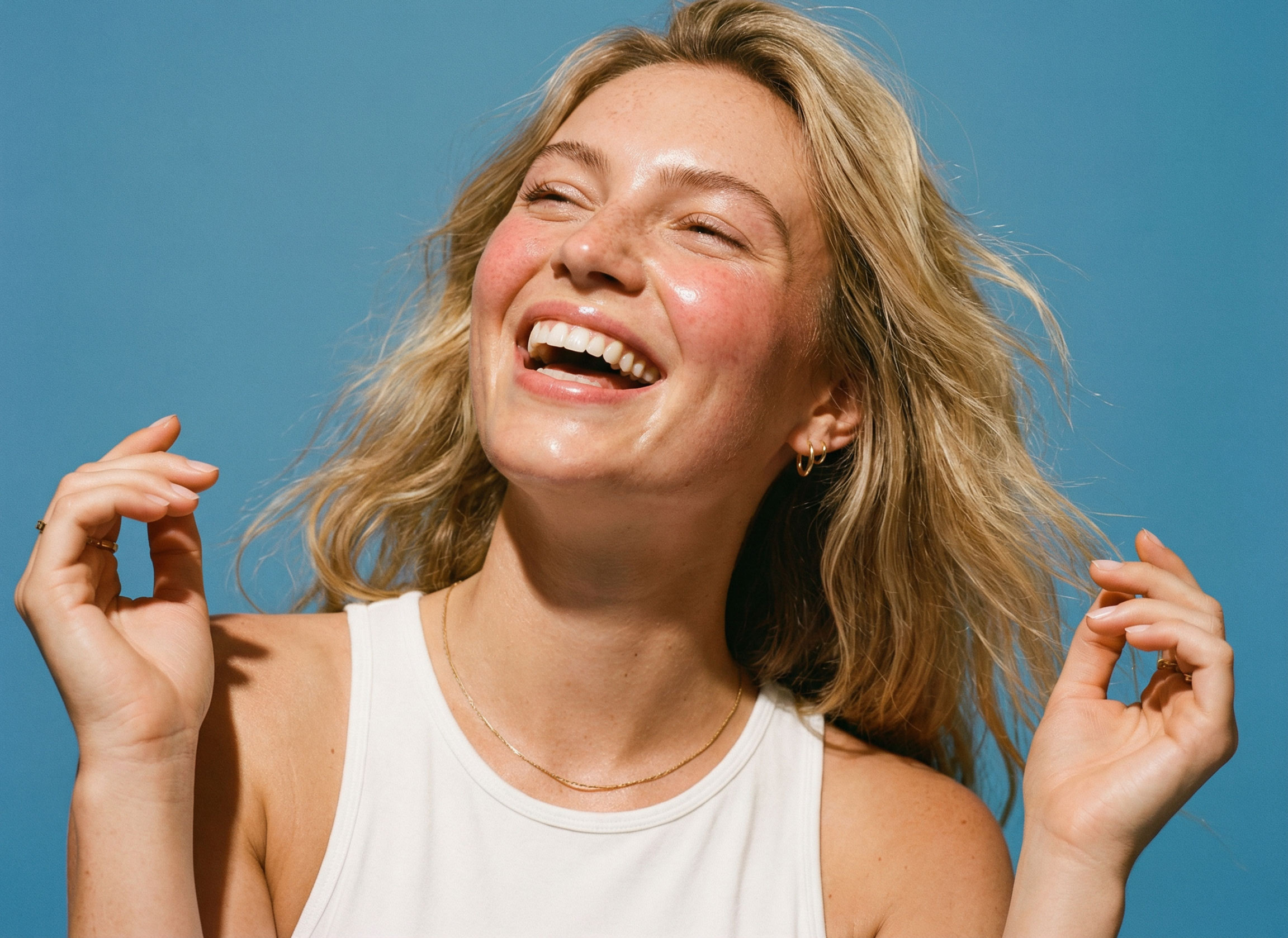 Happy female smiling outdoors.