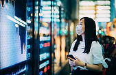 Woman Analyzing Screens
