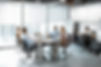 Team Working in Glass Partitioned Office