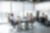 Team Working in Glass Partitioned Office
