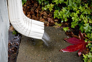 gutter spout on a rainy day