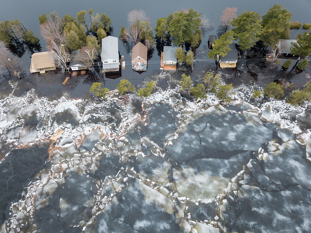 Flash Flooding. Homes deluged by flood water overhead view.