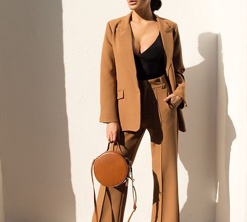 Woman in Camel Suit
