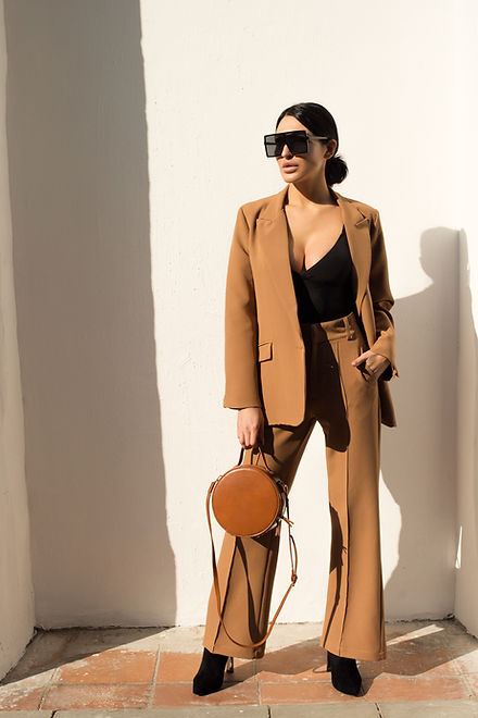 Woman in Camel Suit