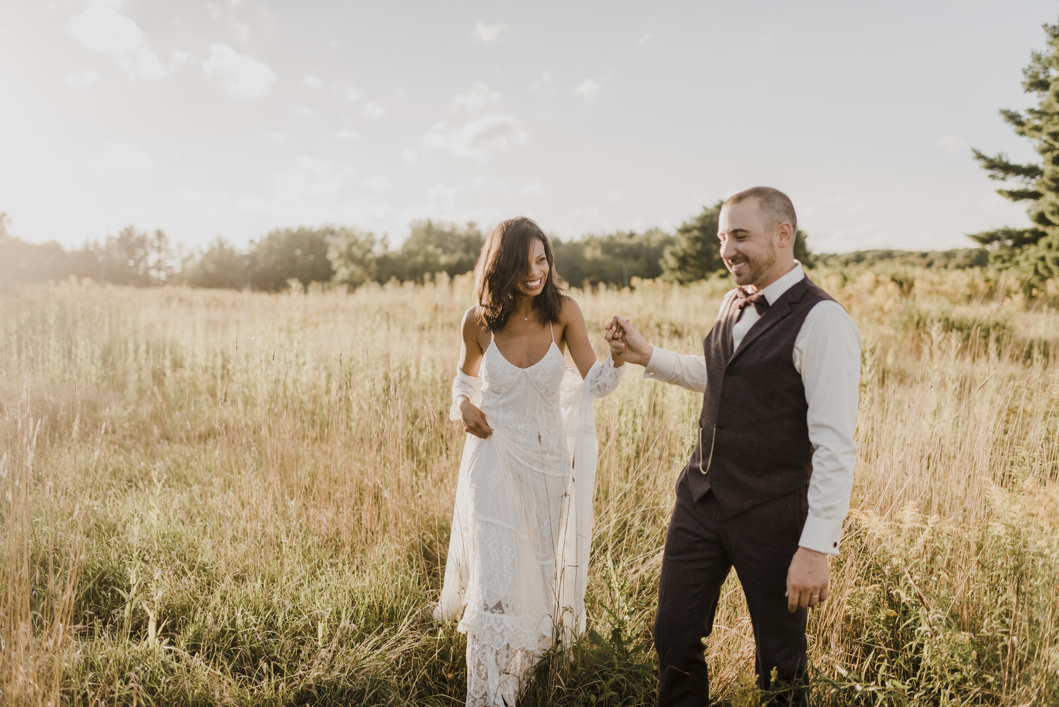 Couple in grassy field