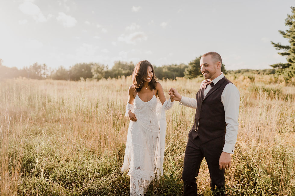 Couple in grassy field
