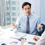 A man talking with a colleague