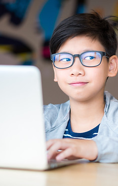 Schoolboy Using Tablet 