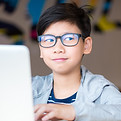 Schoolboy Using Tablet 