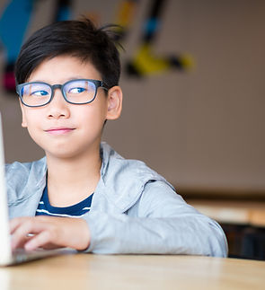 Schoolboy Using Tablet 