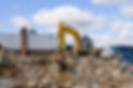 Excavator and Rubble Crusher or Grinder on a demolition site in North East England