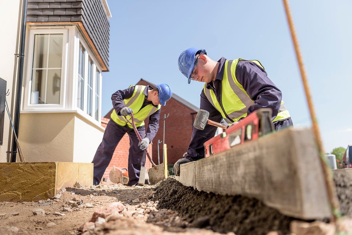 Builders working on a housing project