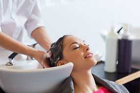 hair being shampoo with organic shampoo and conditioner