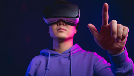 Employee using a VR headset during a virtual reality simulation, symbolizing AI and digital alternatives to corporate retreats