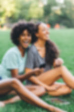 Friends laughing outdoors