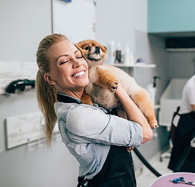 Woman Hugging Dog