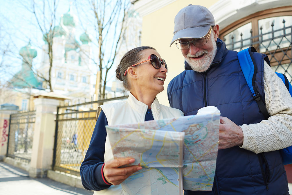 Tourists with Map and Coffee