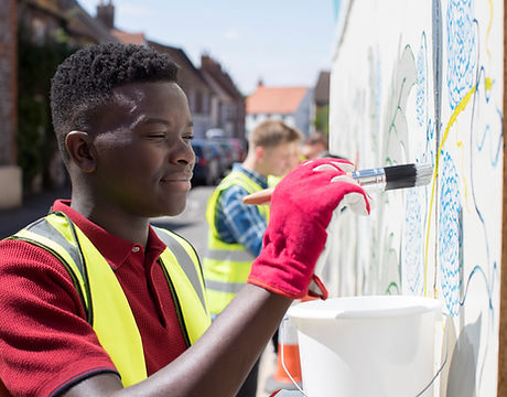 Man Painting a Wall
