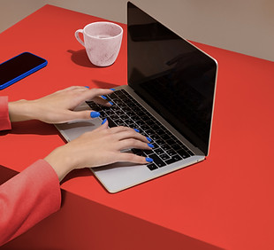 Hands Using Laptop