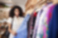 Woman Browsing in Clothing Store