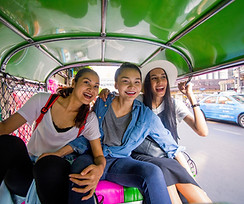 Three women having a good time on Tuk-Tuk