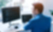 A man looking at a computer screen