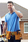 Handwerker am Telefon
