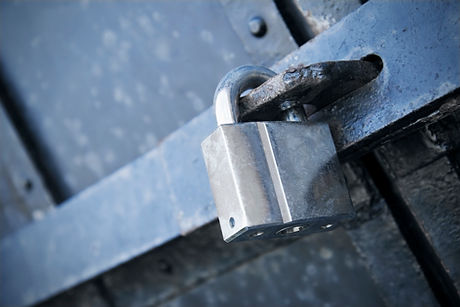 Sturdy metal lock, bar and door