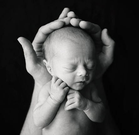 Newborn in Hands