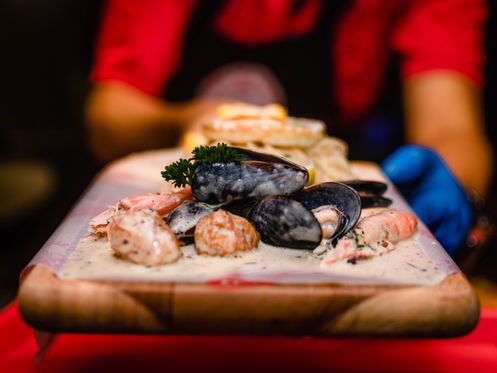 shrimp on a serving board for dinner