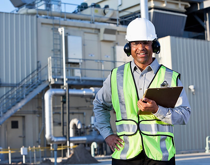 Industrial inspector holding a clipboard
