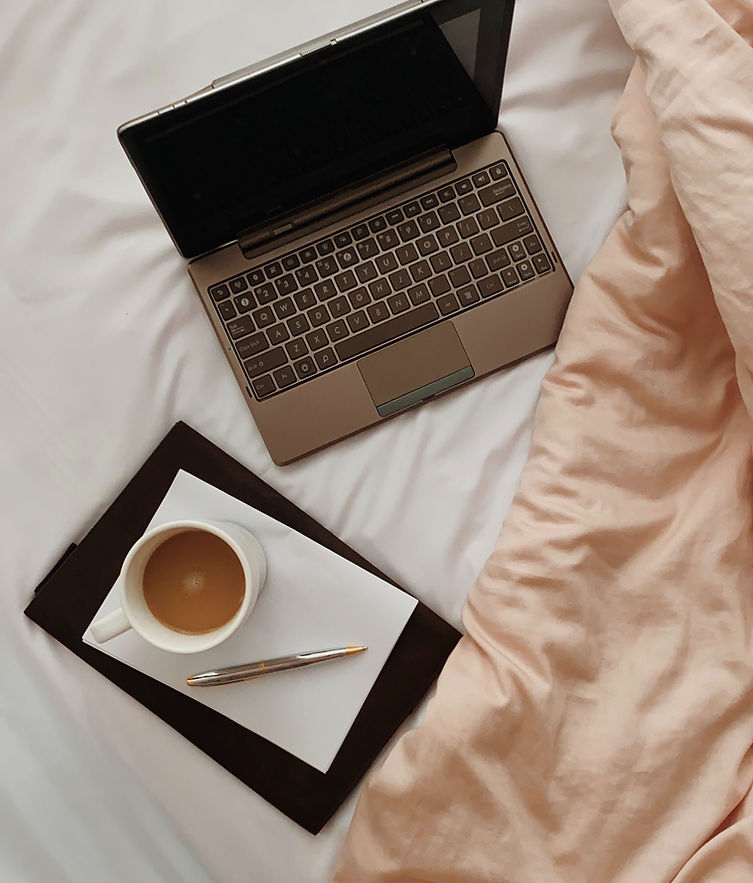 Coffee and Laptop in Bed