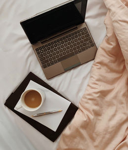 Laptop on bed